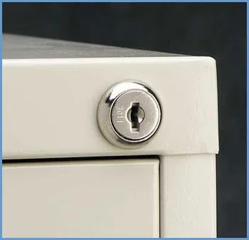 State Locksmith Services Ankeny, IA 515-212-3388 - 12-unlocking-file-cabinet
